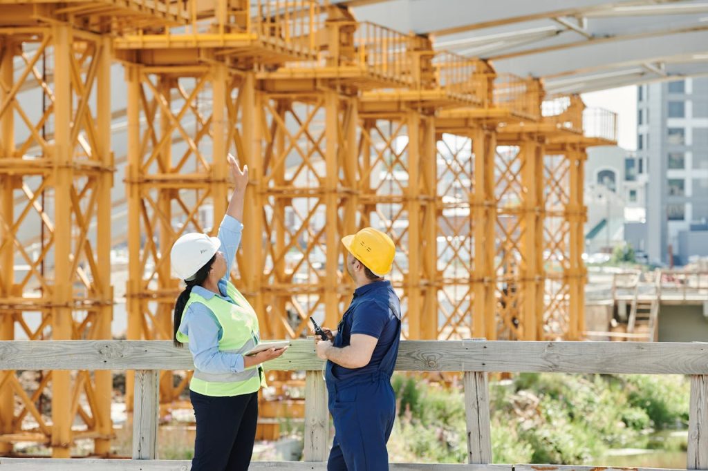 Structural Inspection Professional structural steel inspection engineers at a busy Australian construction site